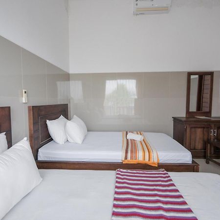 Rommeo Inn Lovina Mitra Reddoorz Temukus Exterior foto